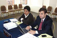 Fellowship recipients and interns take minutes during the 140th period of sessions, October-November 2010